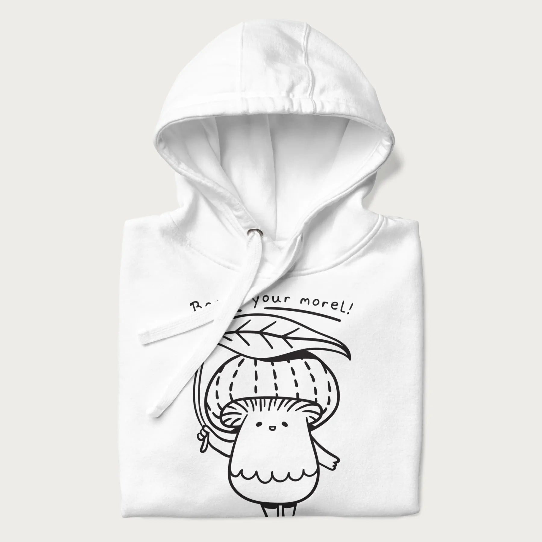 Folded white hoodie with graphic of a cute mushroom holding a leaf with the text "Boost Your Morel."