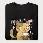 Folded black sweatshirt with Japanese text and a kawaii graphic of a cat drinking bubble tea.