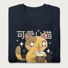 Folded navy blue sweatshirt with Japanese text and a kawaii graphic of a cat drinking bubble tea.