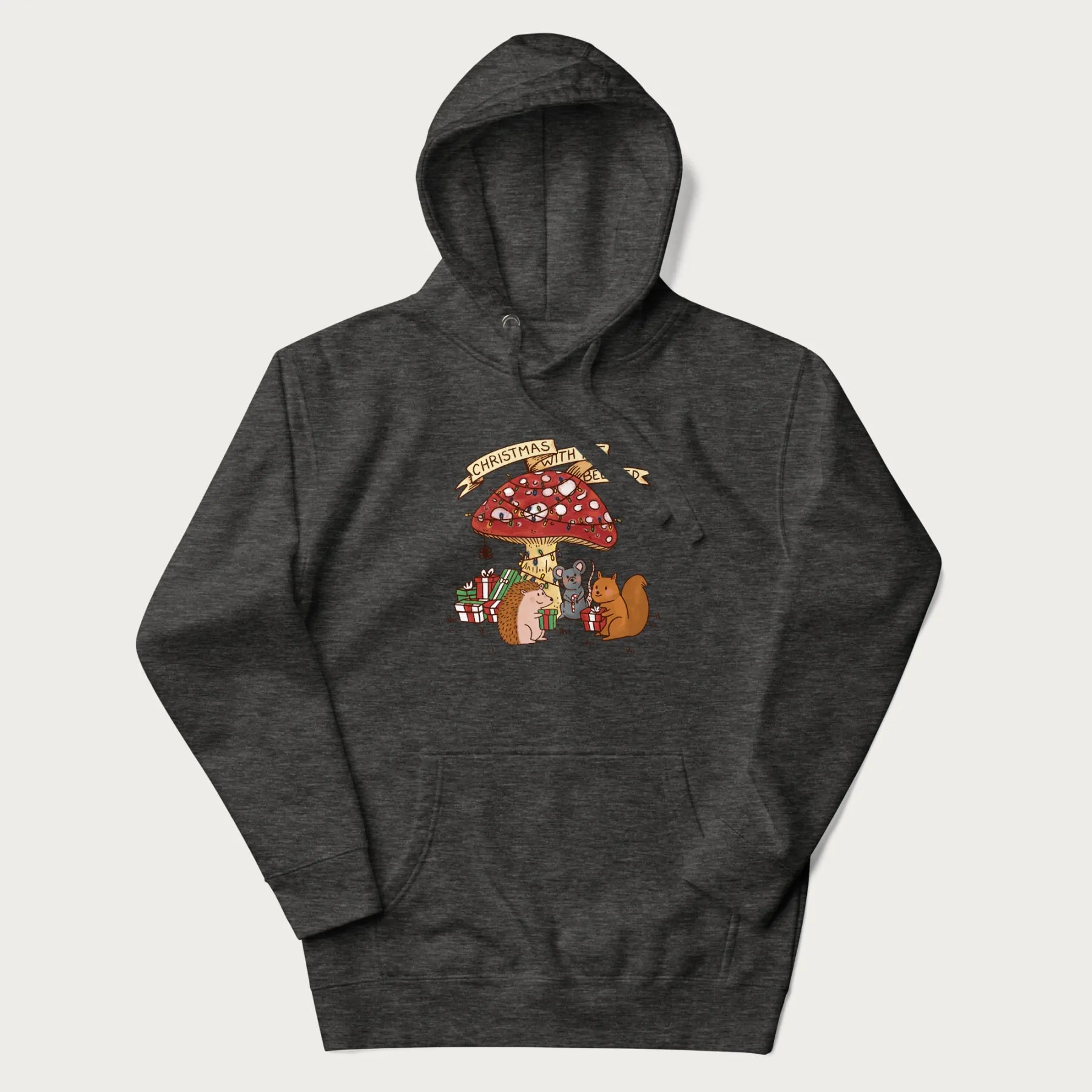 Dark grey hoodie with animal around a festively decorated mushroom and the text 'Christmas with the Beloved' above.