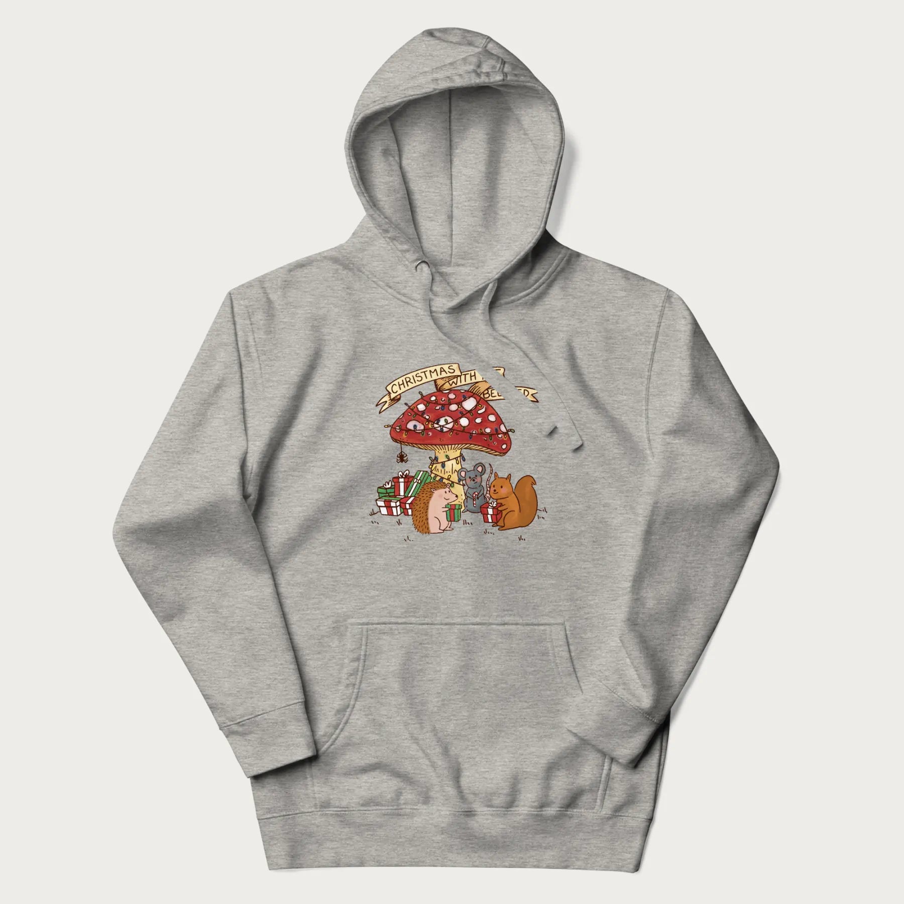 Light grey hoodie with animal around a festively decorated mushroom and the text 'Christmas with the Beloved' above.