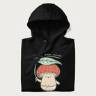 Folded black hoodie with a graphic of an adorable mushroom character with a red cap and the text 'Boost your morel!'.