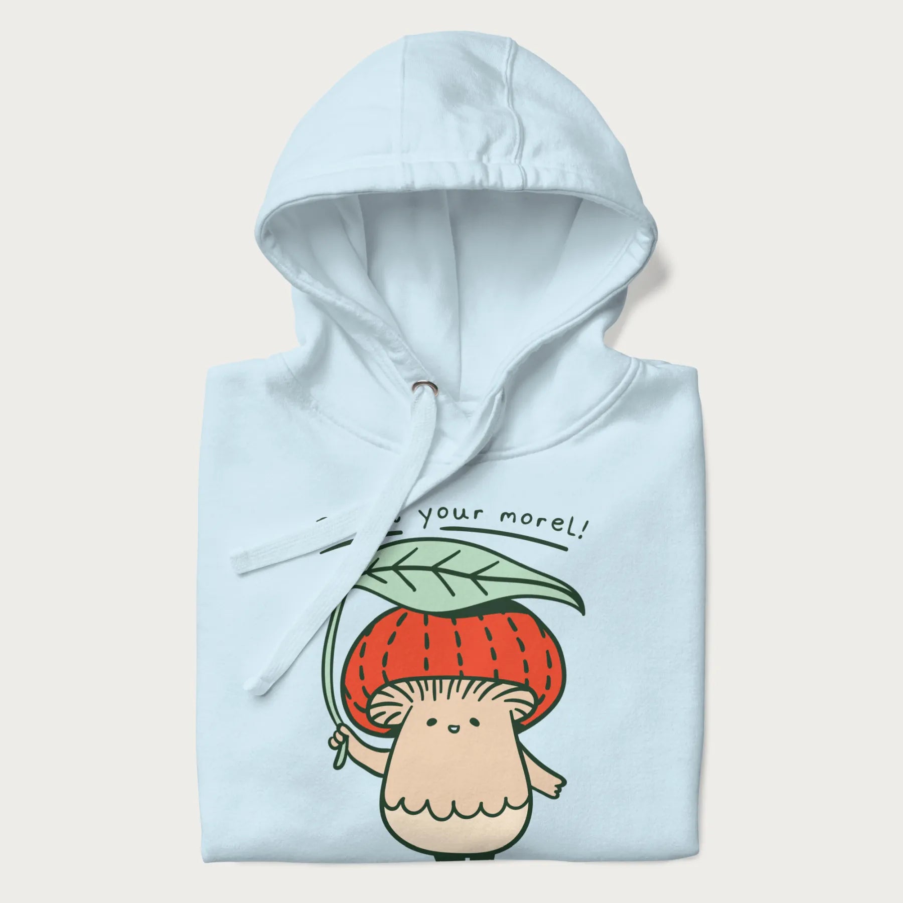 Folded light blue hoodie with a graphic of an adorable mushroom character with a red cap and the text 'Boost your morel!'.