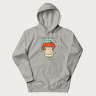 Light grey hoodie with a graphic of an adorable mushroom character with a red cap and the text 'Boost your morel!'.