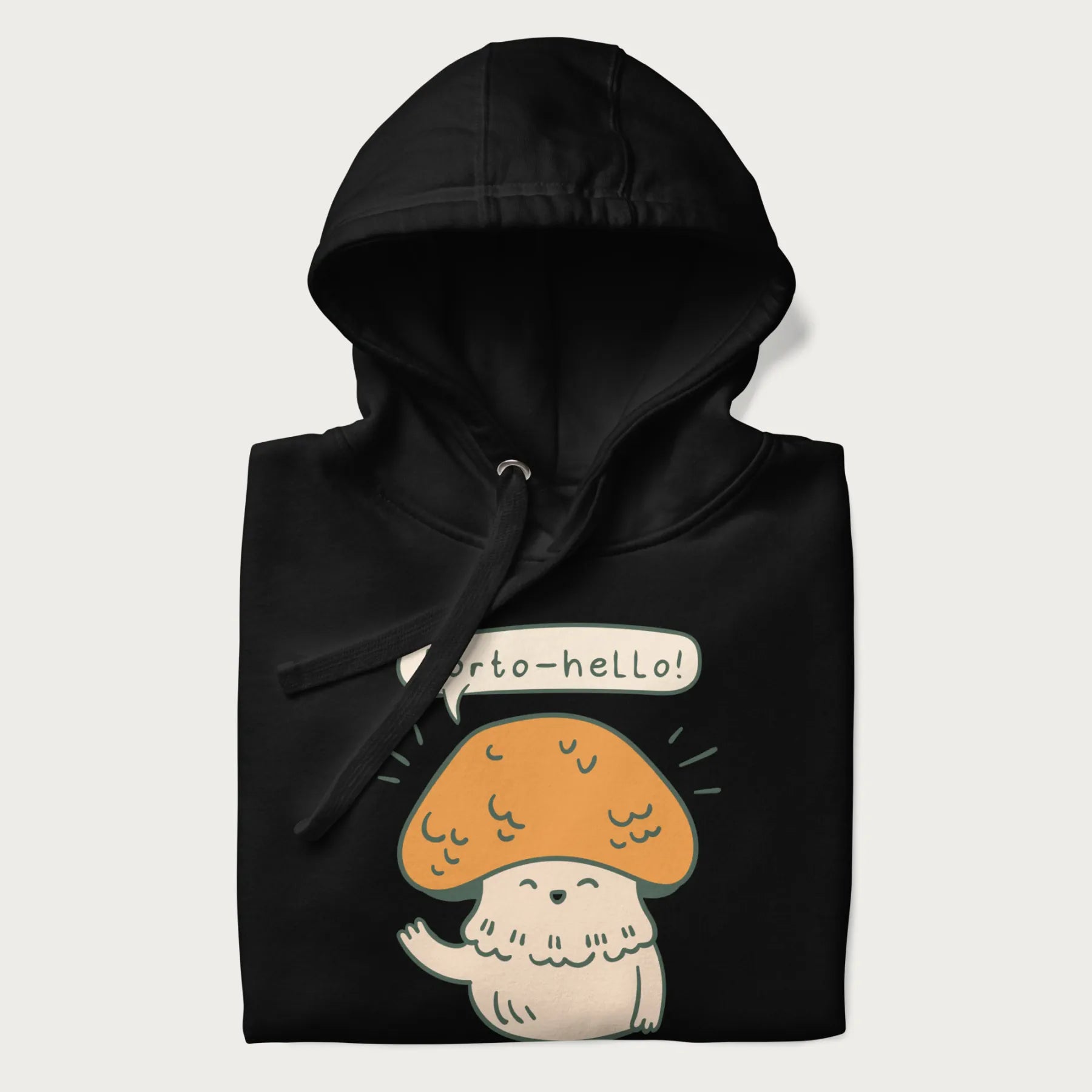 Folded black hoodie with a graphic of a cheerful mushroom character and the text 'Porto-hello!'.