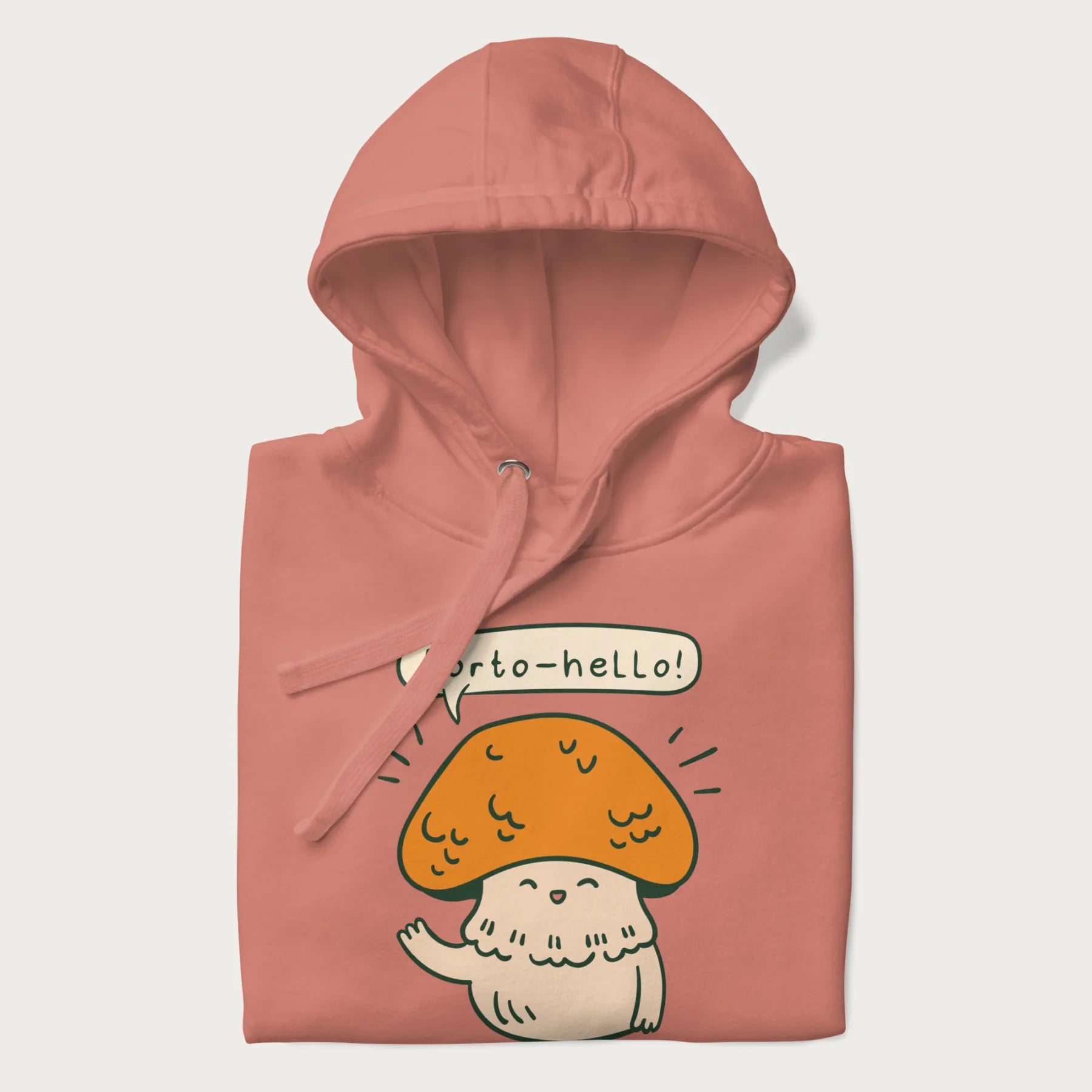 Folded light pink hoodie with a graphic of a cheerful mushroom character and the text 'Porto-hello!'.