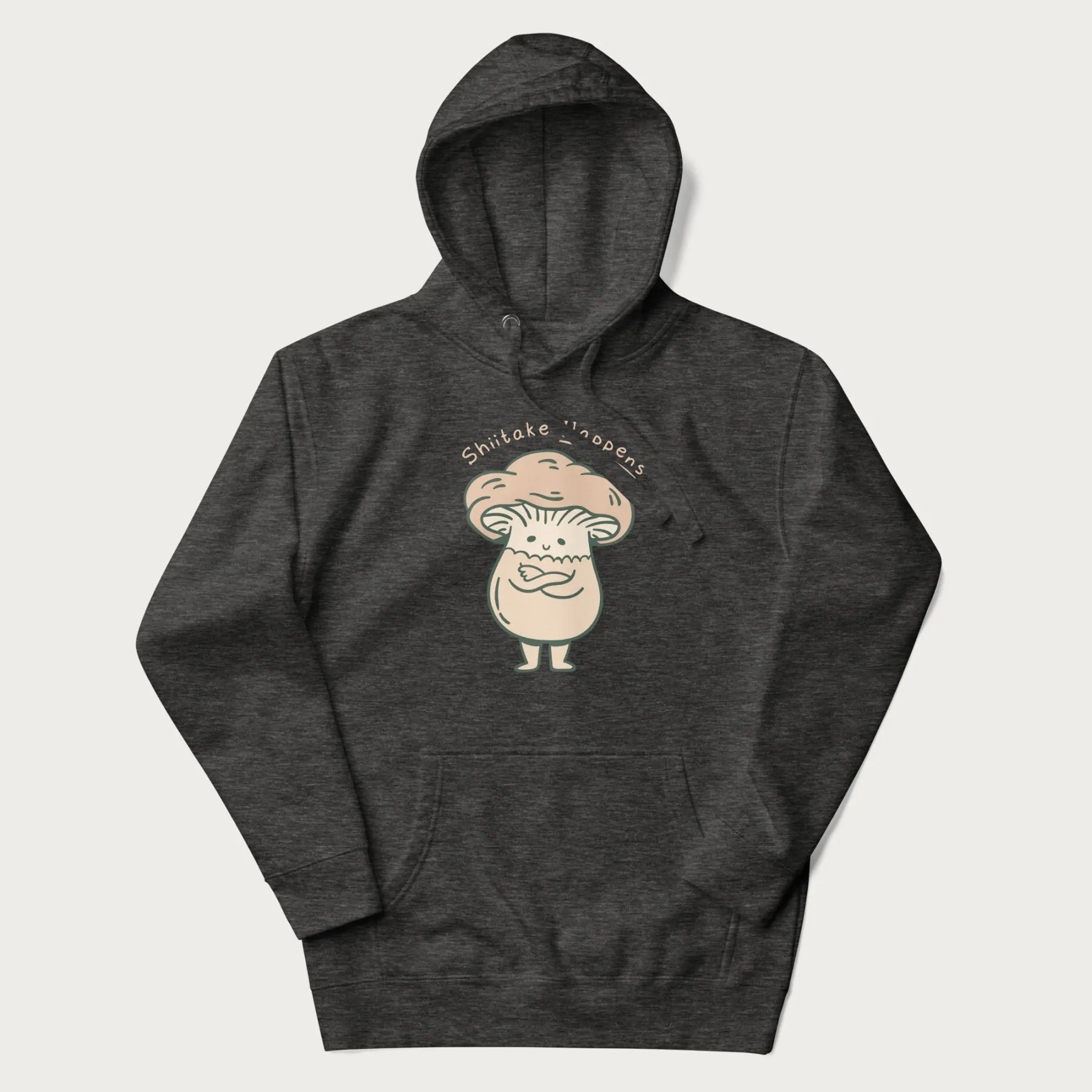 Dark grey hoodie with a graphic of an adorable mushroom character and the text 'Shiitake Happens'.