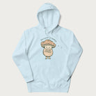 Light blue hoodie with a graphic of an adorable mushroom character and the text 'Shiitake Happens'.