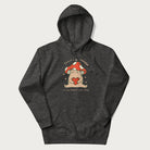 Dark grey hoodie with a graphic of a mushroom character holding a heart and the text 'There's Mushroom in My Heart for You'.