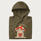 Folded military green hoodie with a graphic of a mushroom character holding a heart and the text 'There's Mushroom in My Heart for You'.