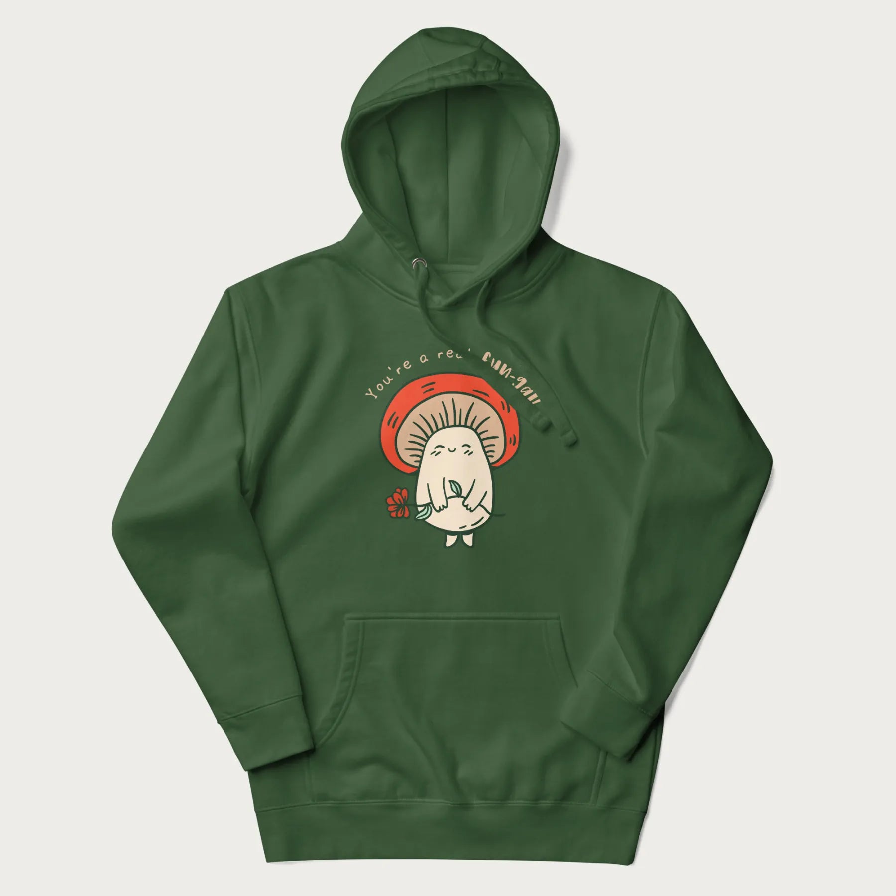 Forest green hoodie with a graphic of a cute mushroom character holding a flower and the text 'You're a real fun-gal!'.