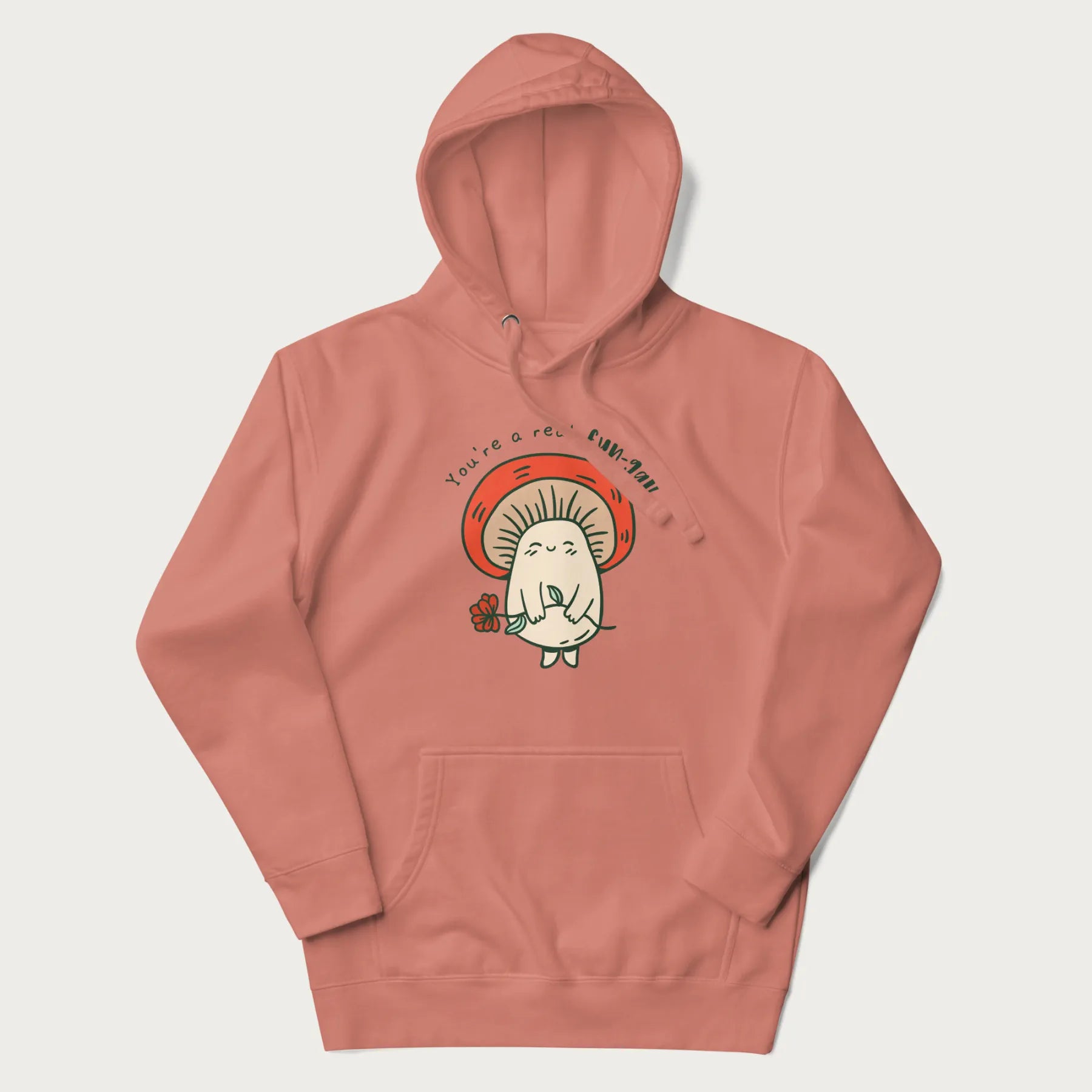 Light pink hoodie with a graphic of a cute mushroom character holding a flower and the text 'You're a real fun-gal!'.