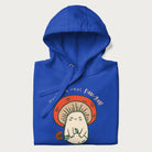 Folded royal blue hoodie with a graphic of a cute mushroom character holding a flower and the text 'You're a real fun-gal!'.