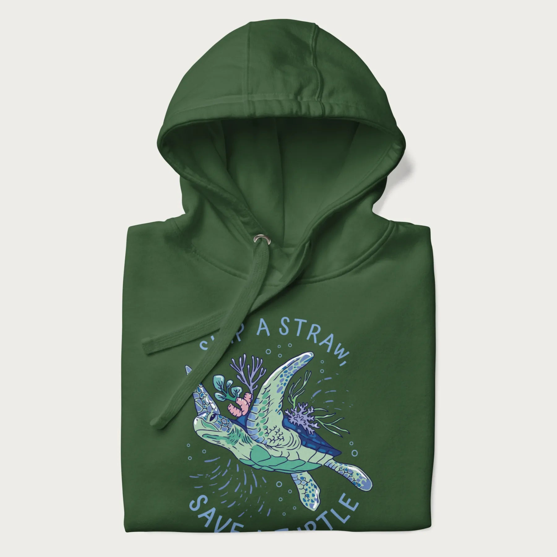 Folded forest green hoodie with a graphic of a sea turtle with coral on it's shell and the text 'Skip a Straw, Save a Turtle'.