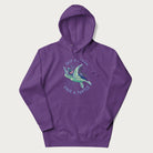 Purple hoodie with a graphic of a sea turtle with coral on it's shell and the text 'Skip a Straw, Save a Turtle'.