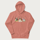 Light pink hoodie with a graphic of three cats in vintage-inspired attire and the text 'Cottagecore Cats'.