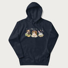 Navy blue hoodie with a graphic of three cats in vintage-inspired attire and the text 'Cottagecore Cats'.