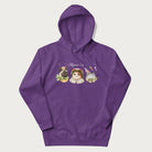 Purple hoodie with a graphic of three cats in vintage-inspired attire and the text 'Cottagecore Cats'.