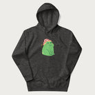 Dark grey hoodie with a graphic of a green frog wearing a mushroom cap surrounded by stars.