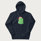 Navy blue hoodie with a graphic of a green frog wearing a mushroom cap surrounded by stars.