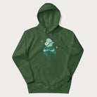 Forest green hoodie with graphic of a frog playing a banjo on a mushroom with stars and a crescent moon.