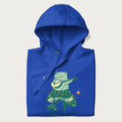 Folded royal blue hoodie with graphic of a frog playing a banjo on a mushroom with stars and a crescent moon.