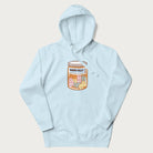 Cartoon cats in a pill bottle labeled 'Happy Pills' on a light blue hoodie.