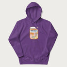 Cartoon cats in a pill bottle labeled 'Happy Pills' on a purple hoodie.
