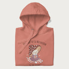 Folded light pink hoodie with a cute mushroom character and the text 'You Take Up So Mushroom in My Heart'.