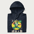 Folded navy blue hoodie with Japanese text and retro graphic of a cyborg.