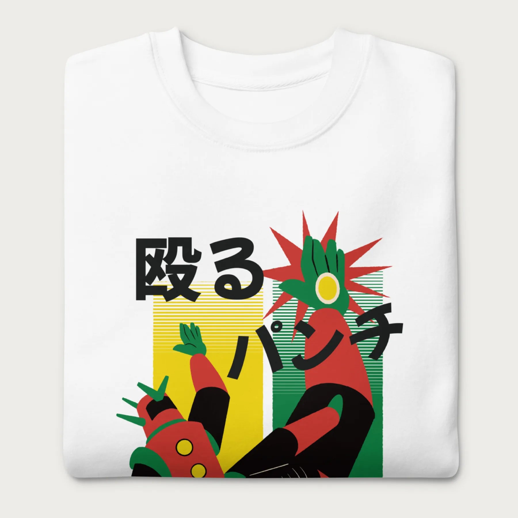 Folded white sweatshirt with Japanese text and a retro mecha punch graphic.