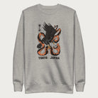 Light grey sweatshirt with Japanese text and a graphic of an eagle and a snake in combat.