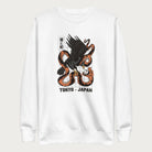 White sweatshirt with Japanese text and a graphic of an eagle and a snake in combat.