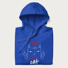 Folded royal blue hoodie with a graphic of a cat raising its middle fingers, with the phrase "F*ck You, I'm a Cat" in red text.