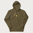 Military green hoodie with a graphic of a frog lounging in a hammock between tall mushrooms.