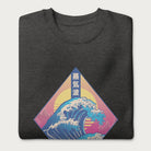 Folded dark grey sweatshirt with a graphic of the Japanese Great Wave, a retro sun, and Japanese text.