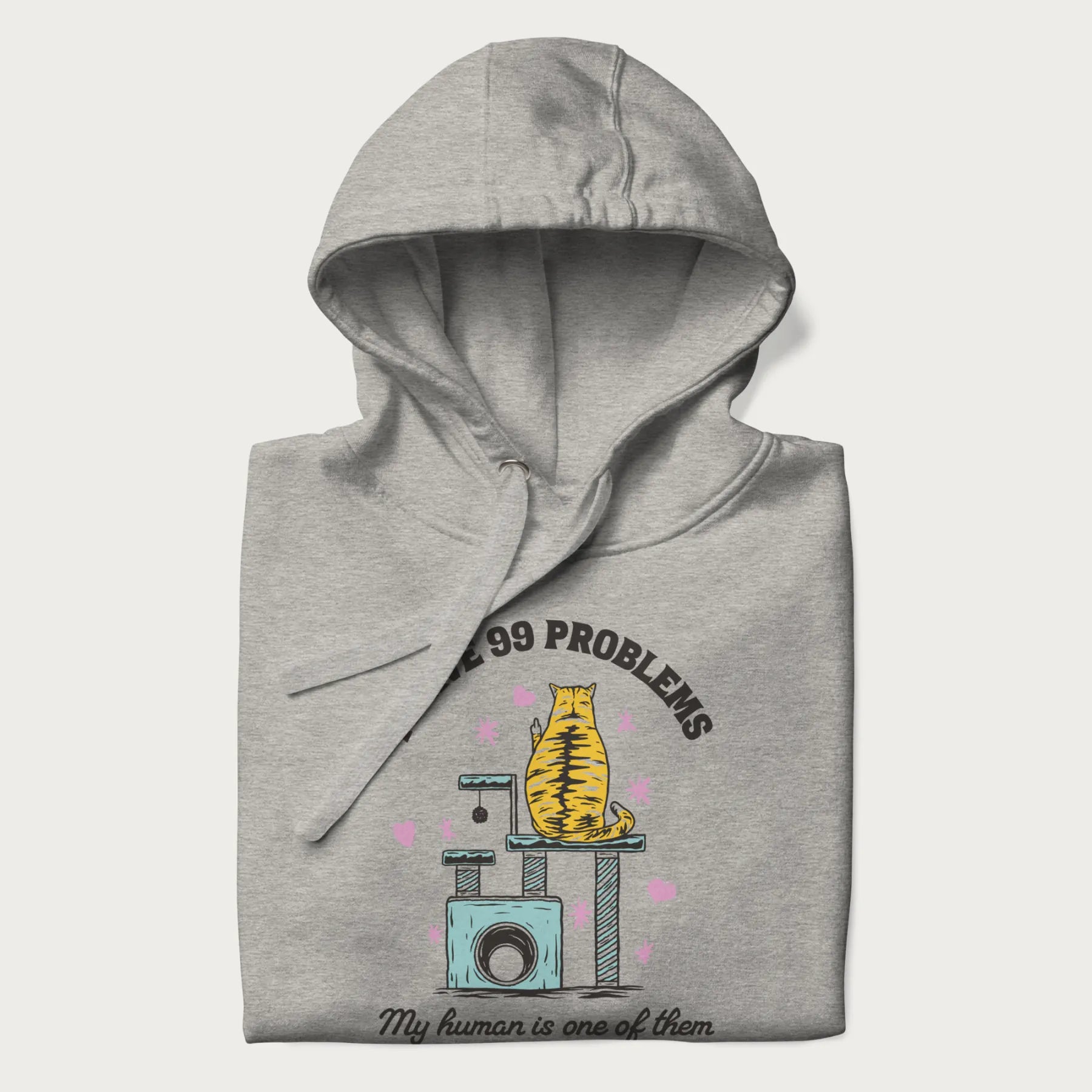Folded light grey hoodie with graphic of a cat on a scratching post and text 'i have 99 problems, my human is one of them'.