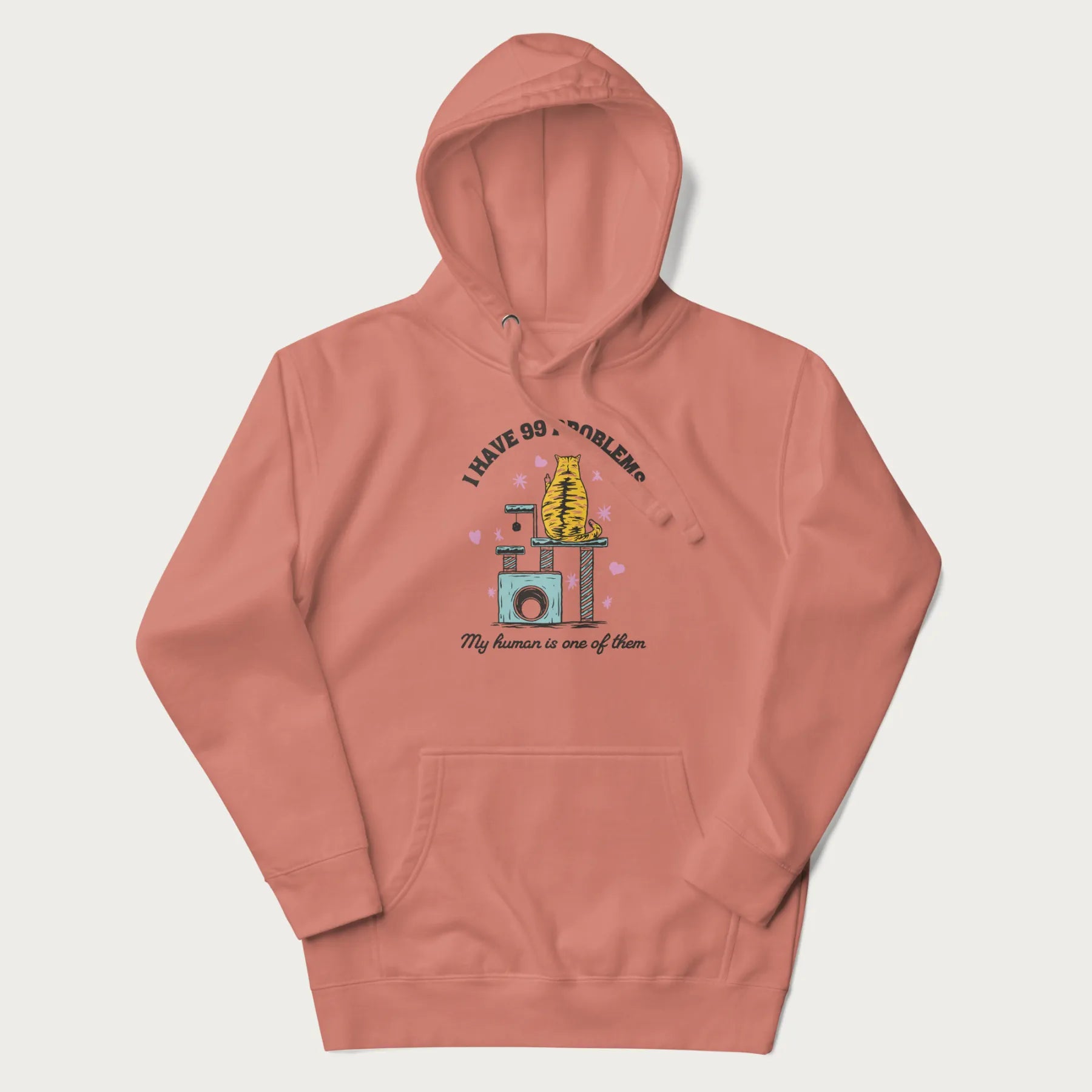 Light pink hoodie with graphic of a cat on a scratching post and text 'i have 99 problems, my human is one of them'.