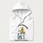 Folded white hoodie with graphic of a cat on a scratching post and text 'i have 99 problems, my human is one of them'.