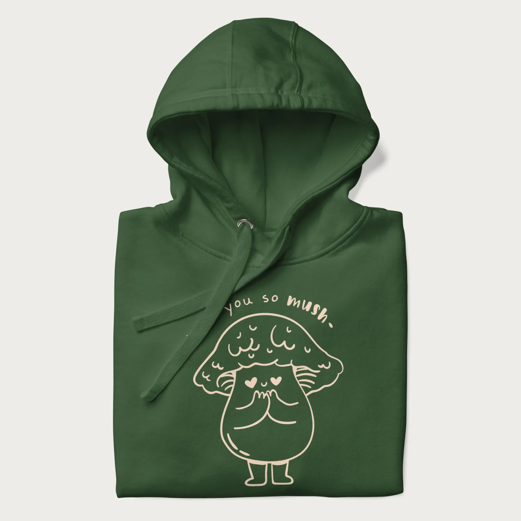 Folded forest green hoodie with graphic of a cute mushroom with heart-shaped eyes and the text "I Love You So Mush."