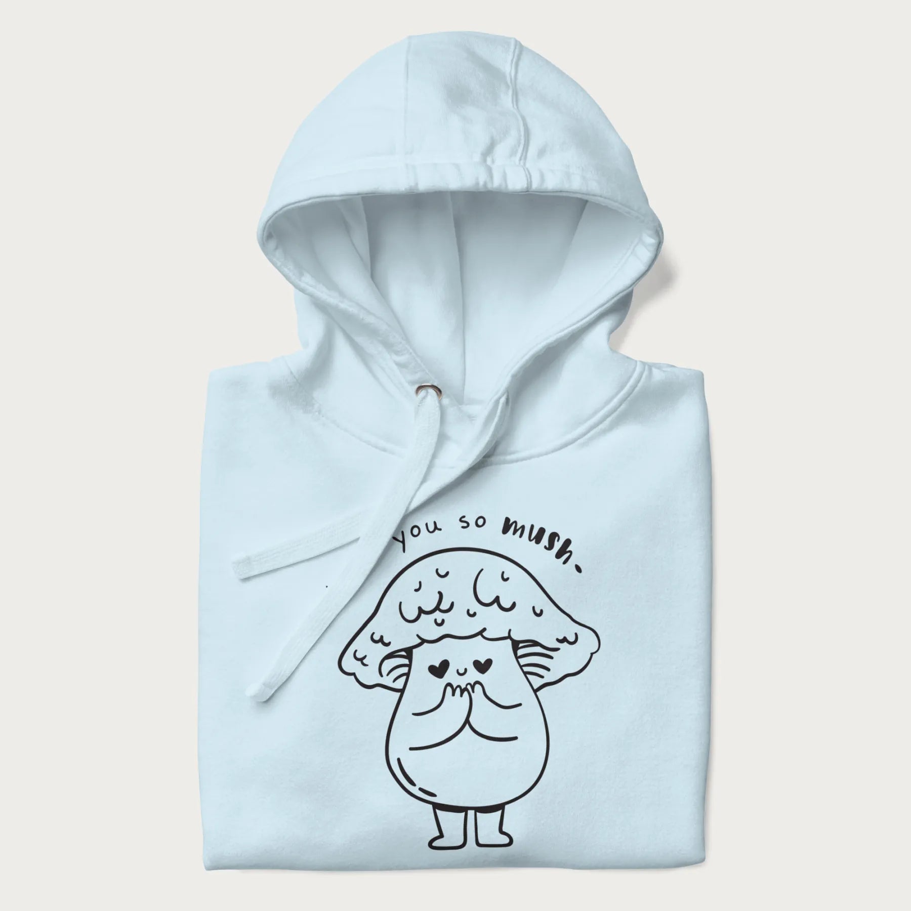 Folded light blue hoodie with graphic of a cute mushroom with heart-shaped eyes and the text "I Love You So Mush."