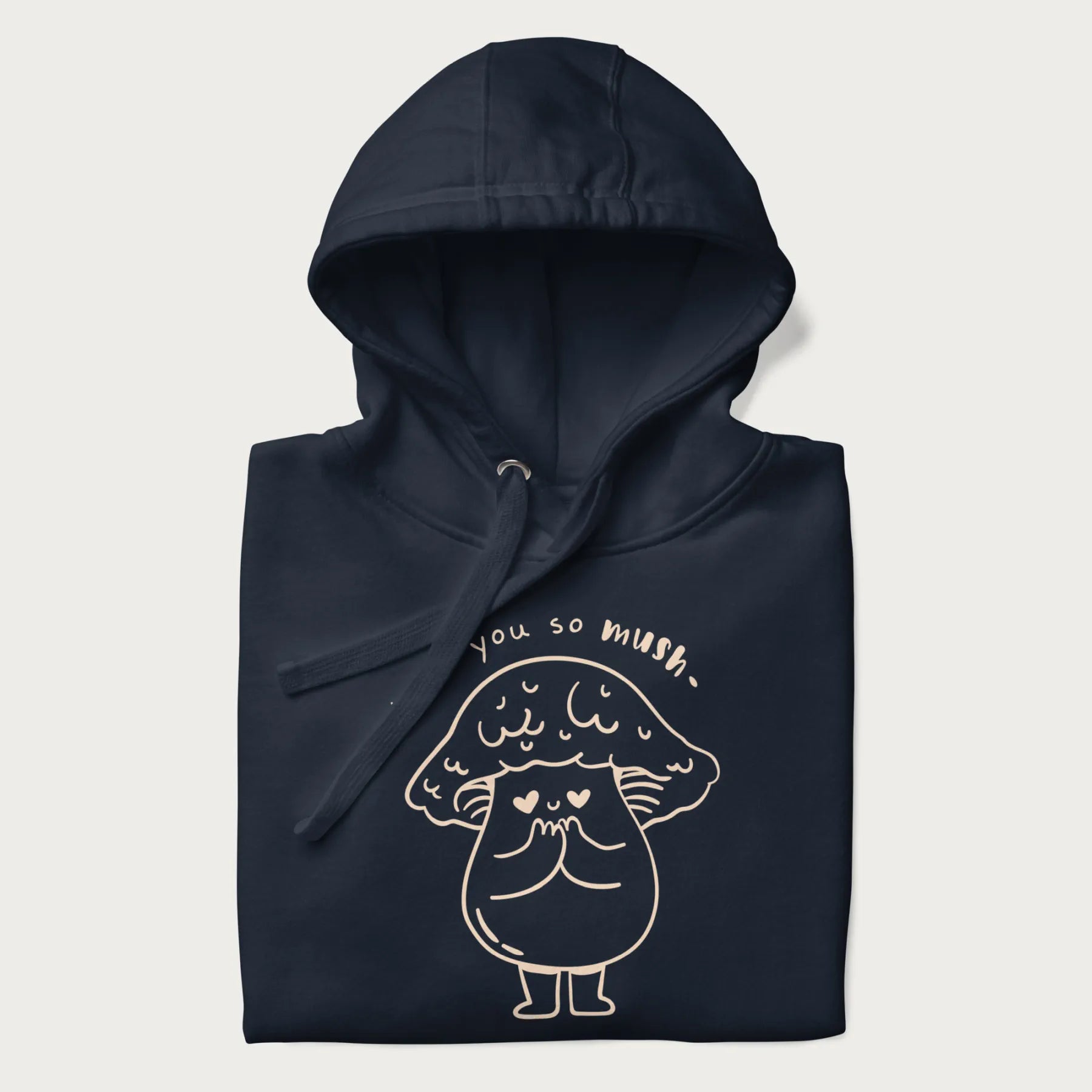 Folded navy blue hoodie with graphic of a cute mushroom with heart-shaped eyes and the text "I Love You So Mush."