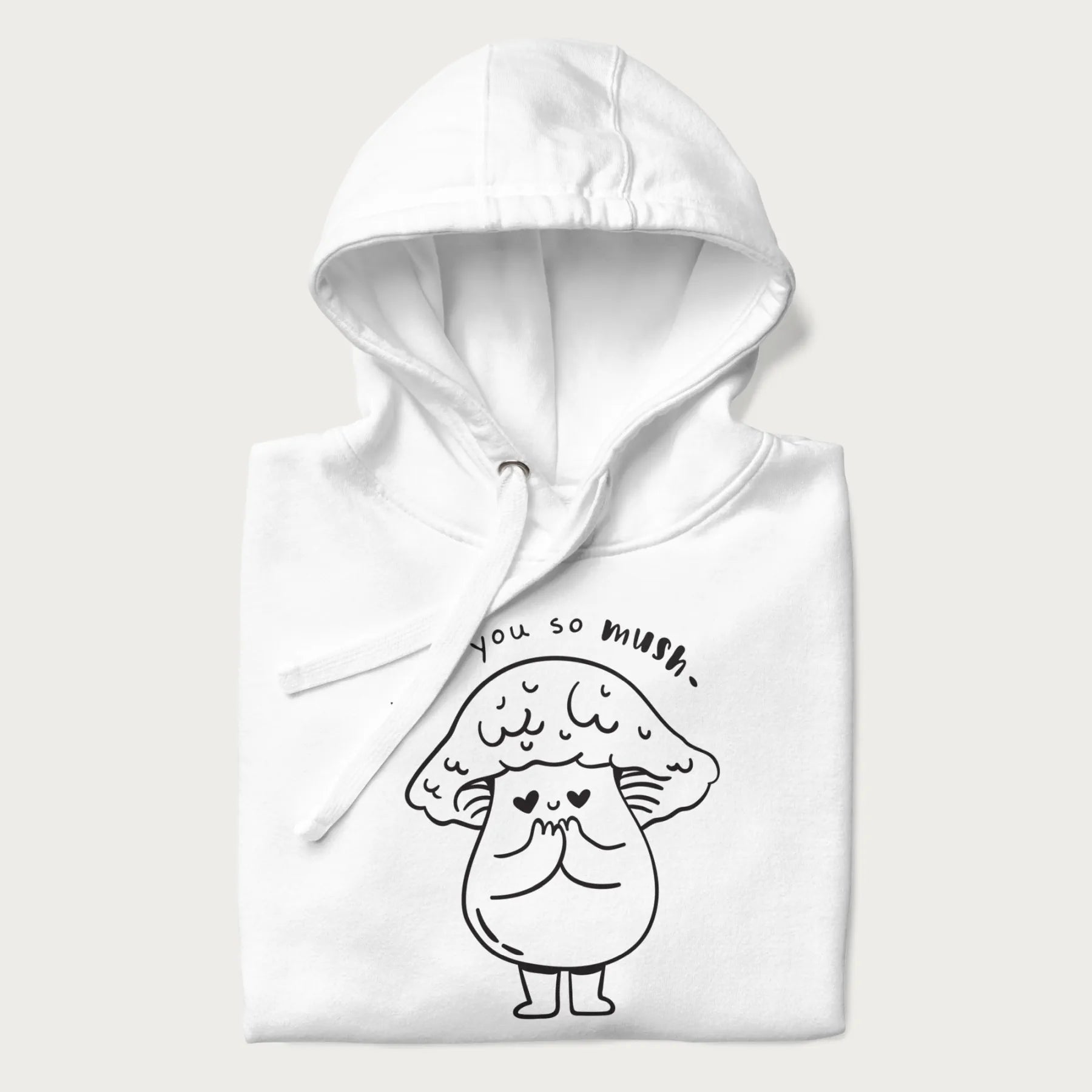 Folded white hoodie with graphic of a cute mushroom with heart-shaped eyes and the text "I Love You So Mush."