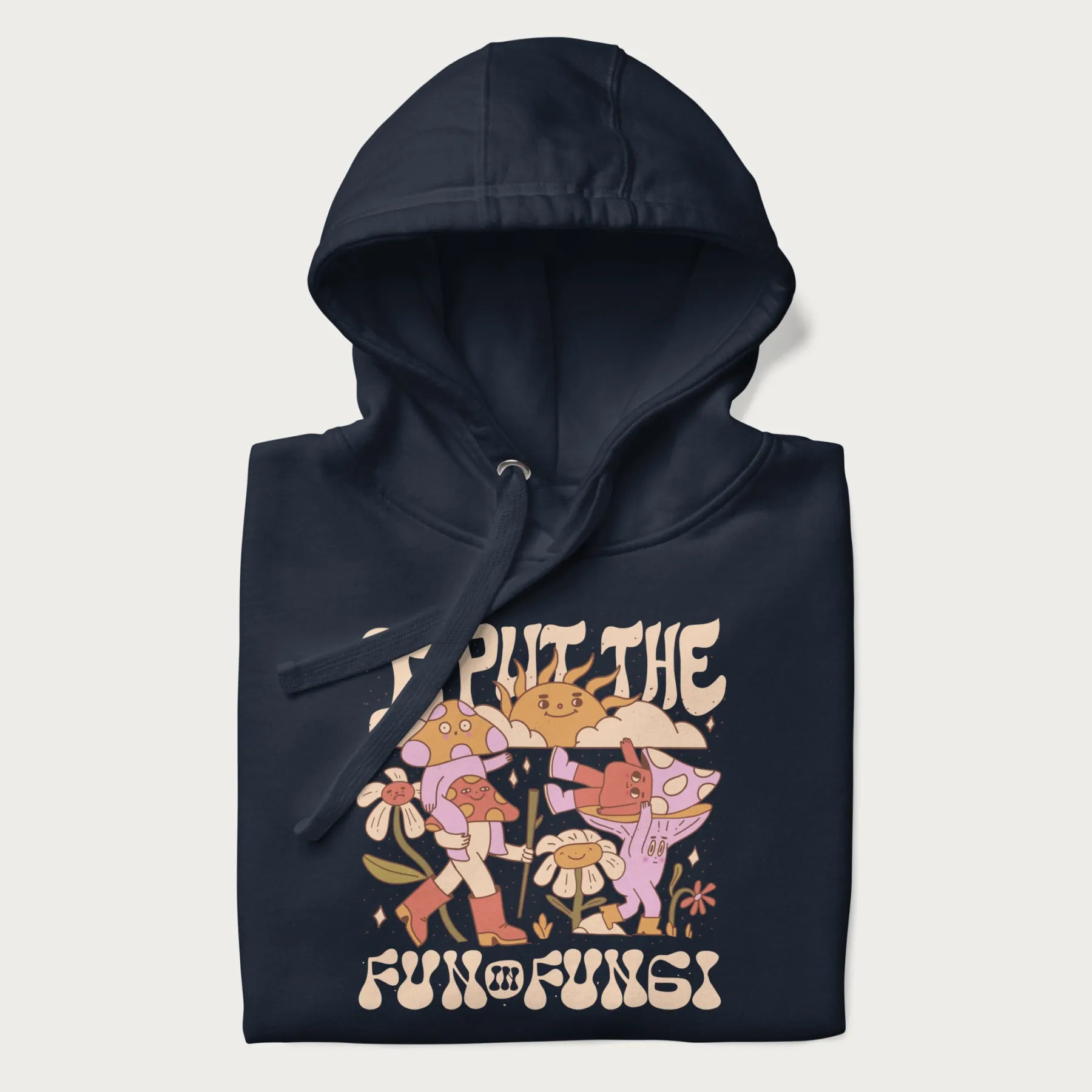 Folded navy blue hoodie with a graphic of cheerful mushroom characters and the text 'I Put the Fun in Fungi'.