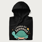 Folded black hoodie with a graphic of a happy turtle on a skateboard and the text 'I Wanna Go Faaaaast'.