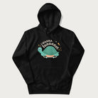 Black hoodie with a graphic of a happy turtle on a skateboard and the text 'I Wanna Go Faaaaast'.