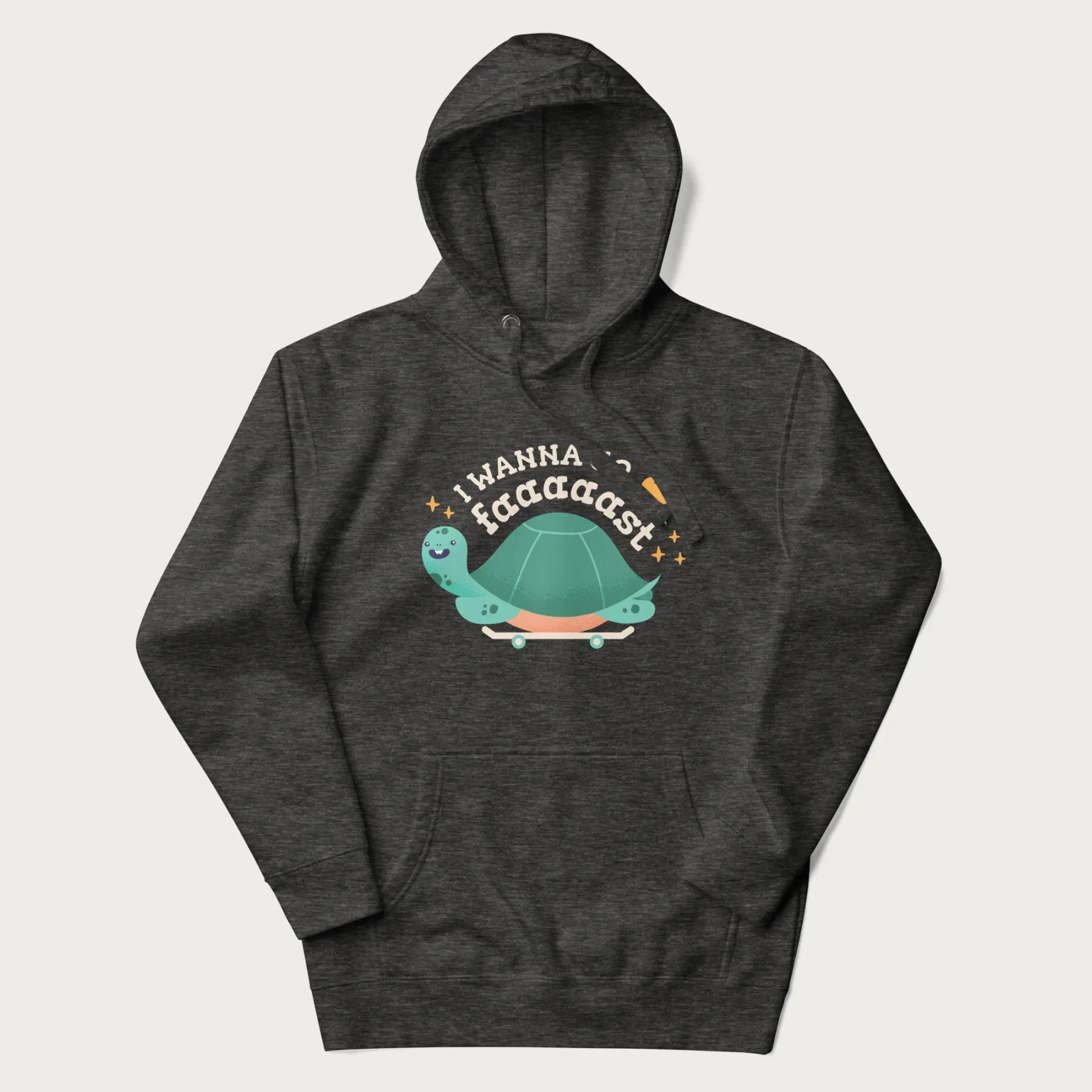 Dark grey hoodie with a graphic of a happy turtle on a skateboard and the text 'I Wanna Go Faaaaast'.