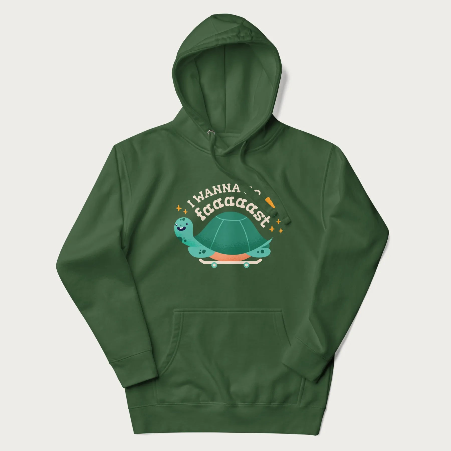 Forest green hoodie with a graphic of a happy turtle on a skateboard and the text 'I Wanna Go Faaaaast'.