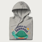 Folded light grey hoodie with a graphic of a happy turtle on a skateboard and the text 'I Wanna Go Faaaaast'.