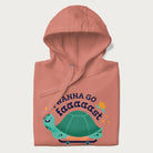 Folded light pink hoodie with a graphic of a happy turtle on a skateboard and the text 'I Wanna Go Faaaaast'.